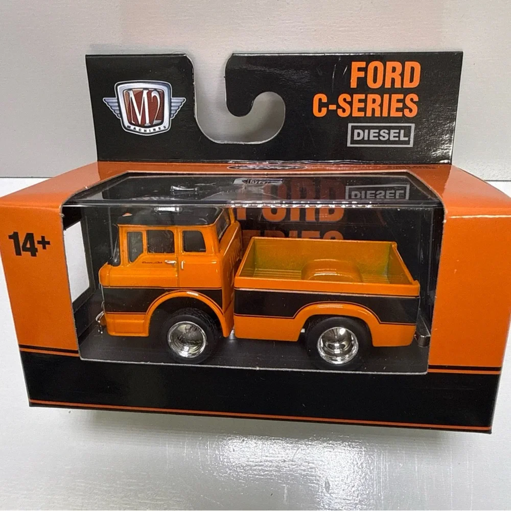 Machine Ford C-Series Diecast Truck - Orange & Black